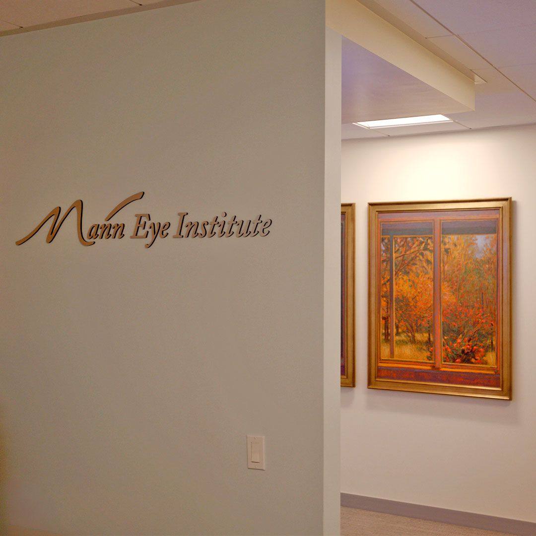 Sleek interior of Mann Eye Institute at Museo Houston, featuring a combination of world-class ophthalmology services and curated fine art.