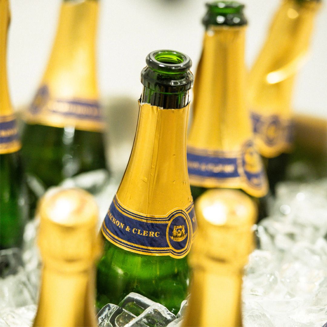 Premium champagne bottles chilling in an ice bucket for a celebratory toast at Museo.