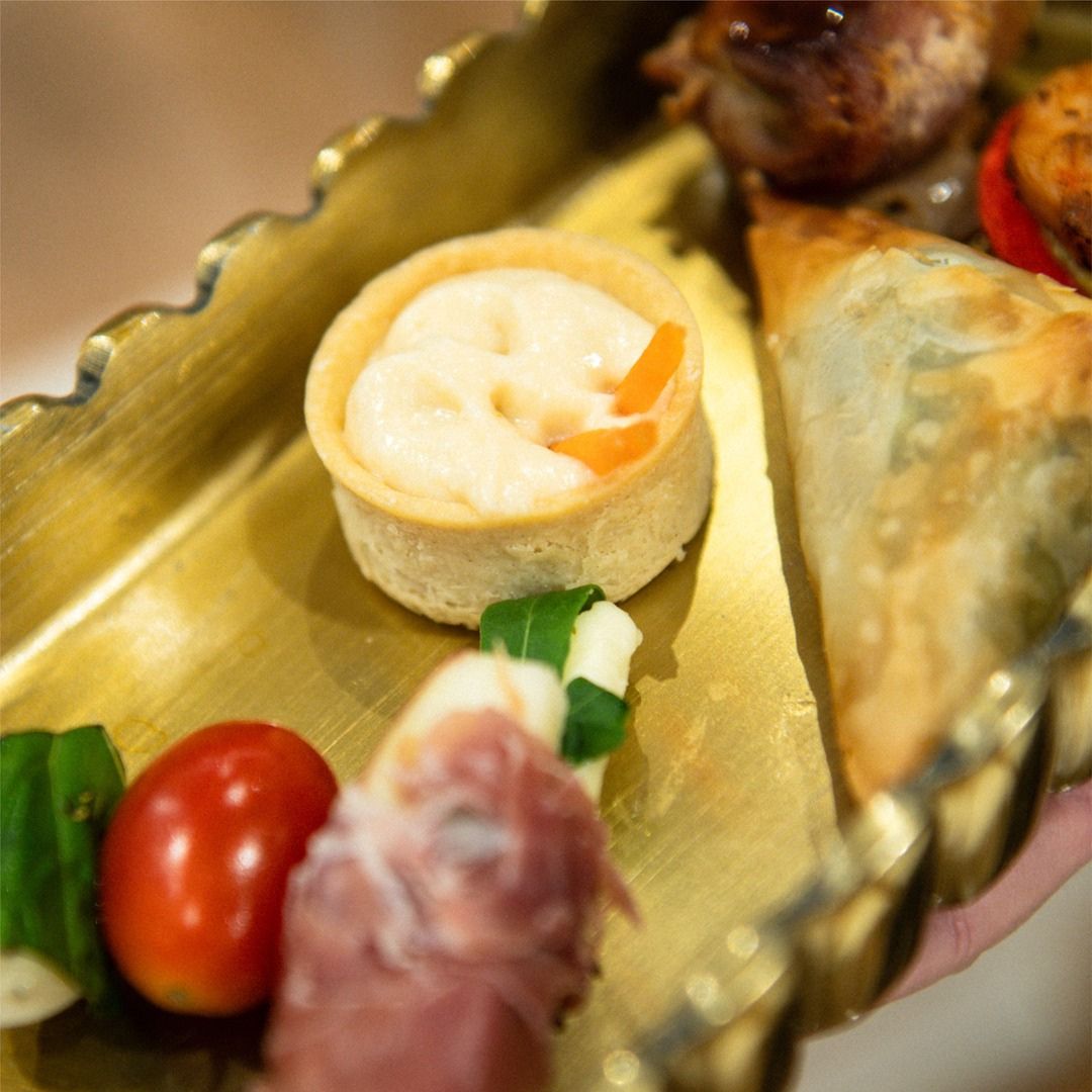 Close-up of a beautifully plated gourmet appetizer provided by premium catering partners.
