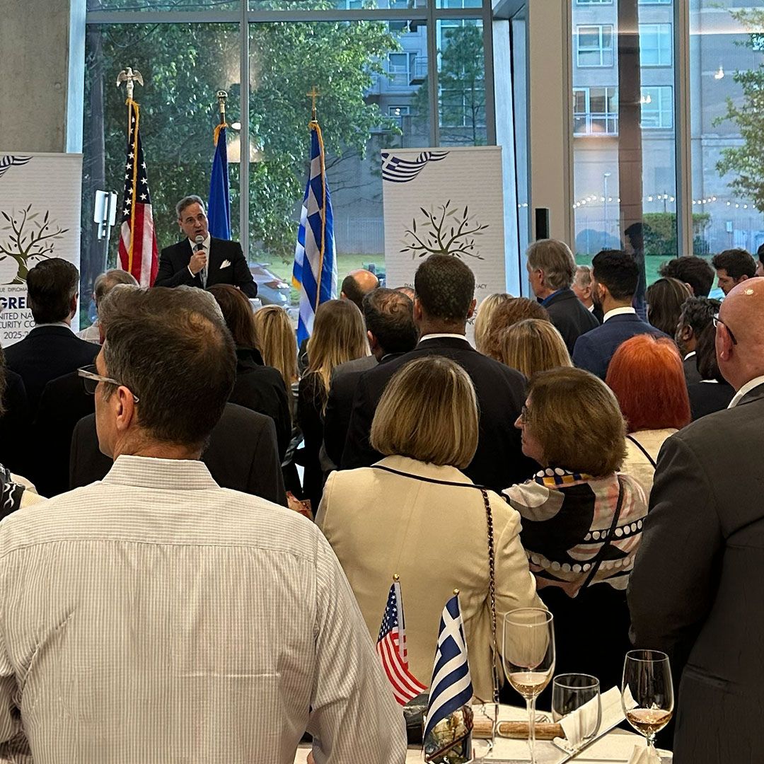 Attendees and flags during the Greek Independence Day Celebration at Museo Houston.