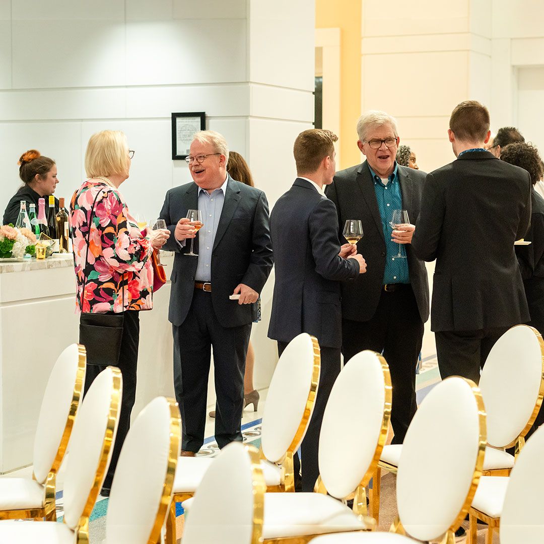 A group of professionals from the Houston medical community enjoying a social gathering at Museo.