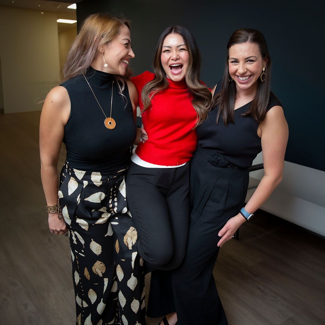 A group of guests laughing and celebrating during a private social event at the Museo medical arts building.